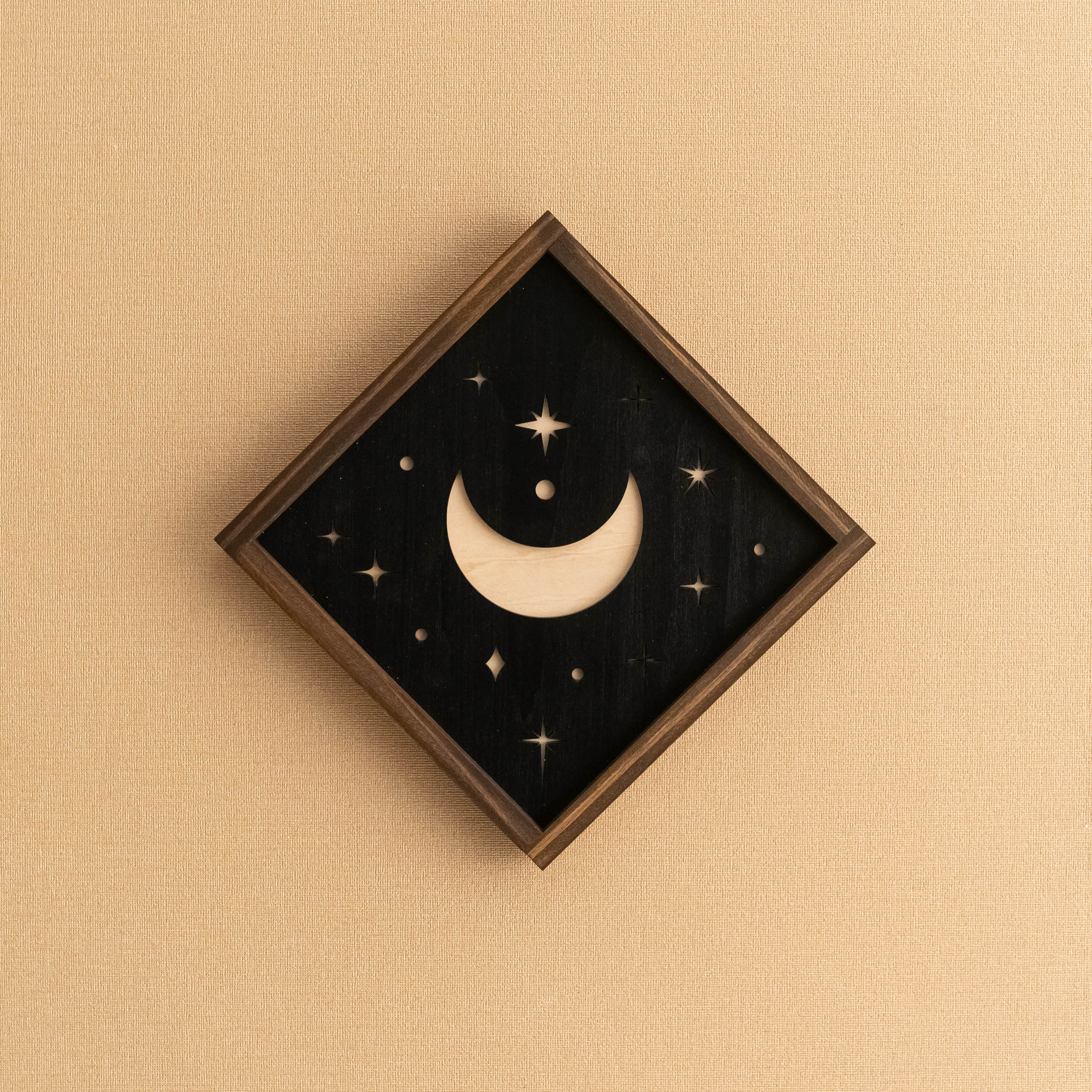Arte de pared de madera con sol y luna para una decoración bohemia celestial