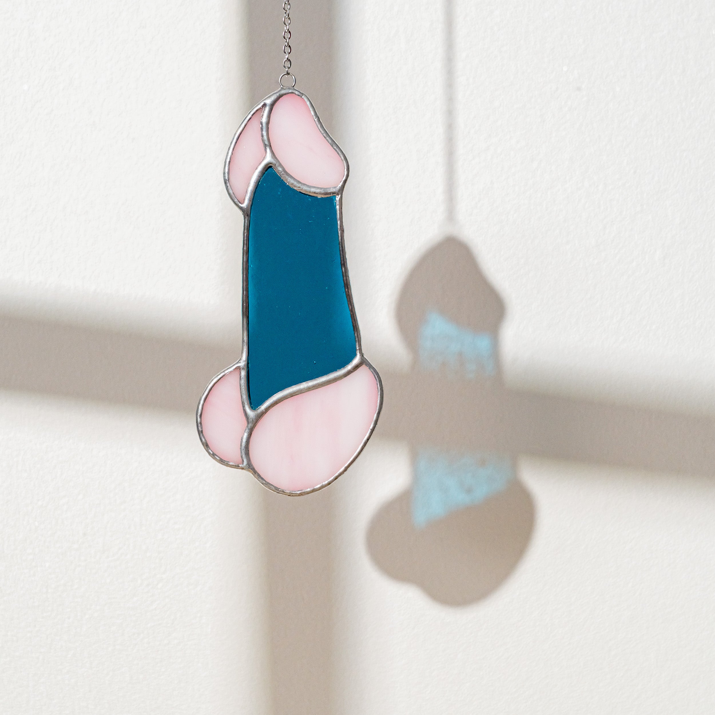 Quirky Stained Glass Penis Art for a Fun Twist