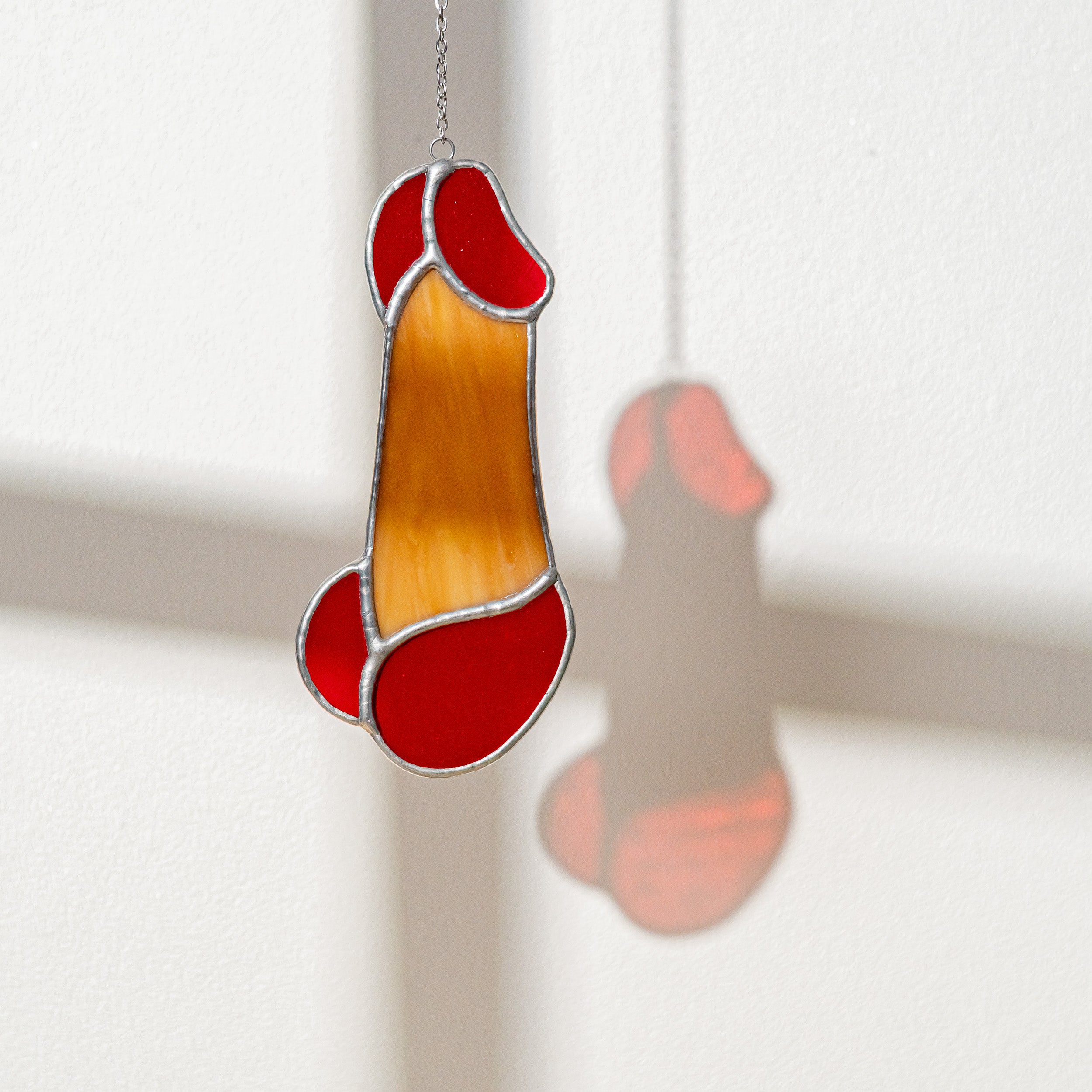 Quirky Stained Glass Penis Art for a Fun Twist