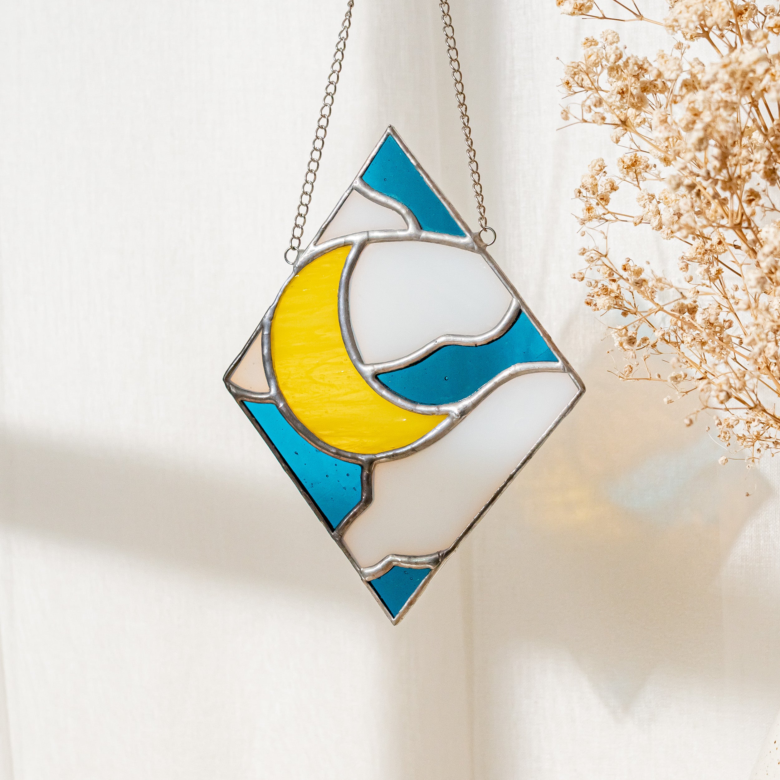 Radiant Sun and Moon Stained Glass for Vibrant Window Reflections