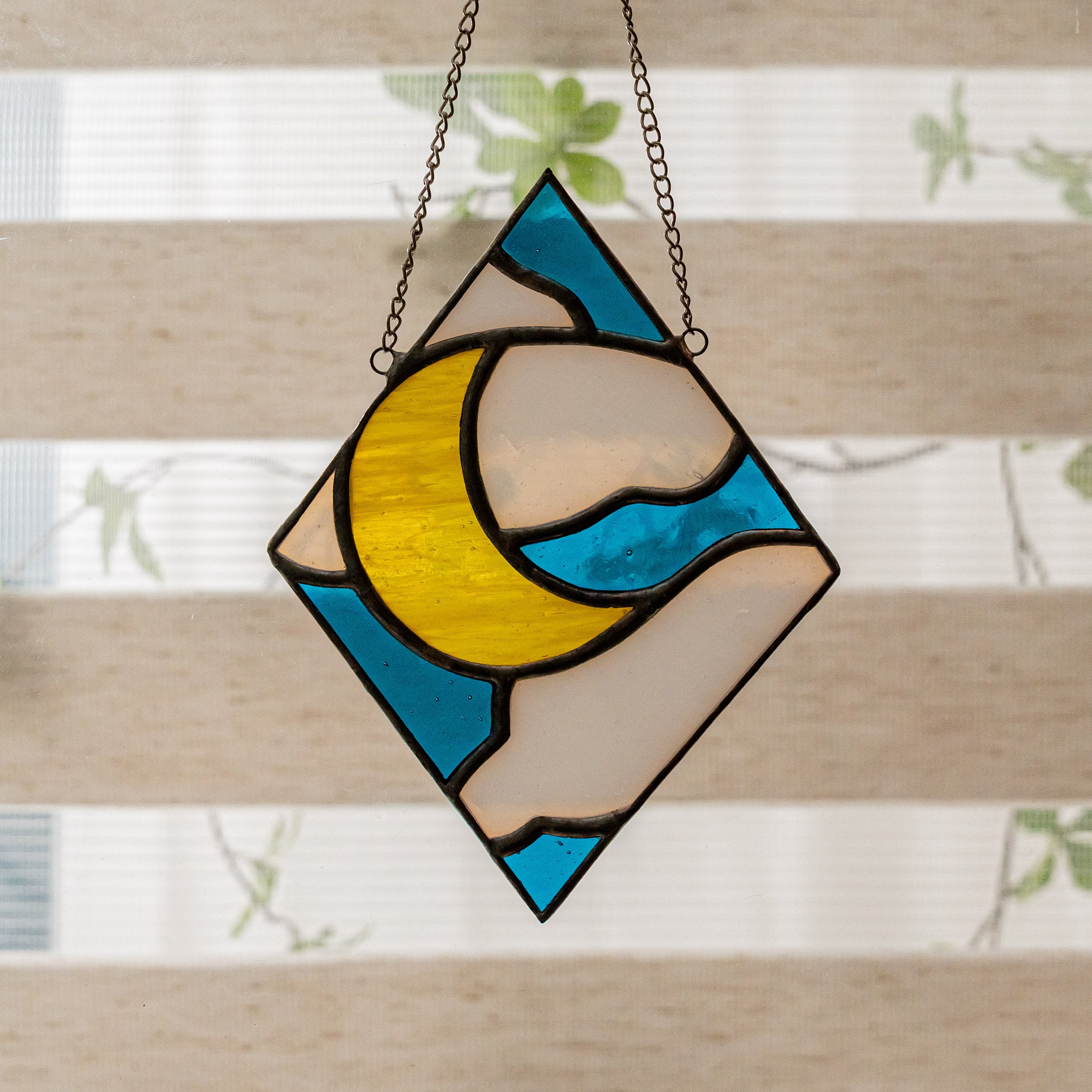 Radiant Sun and Moon Stained Glass for Vibrant Window Reflections